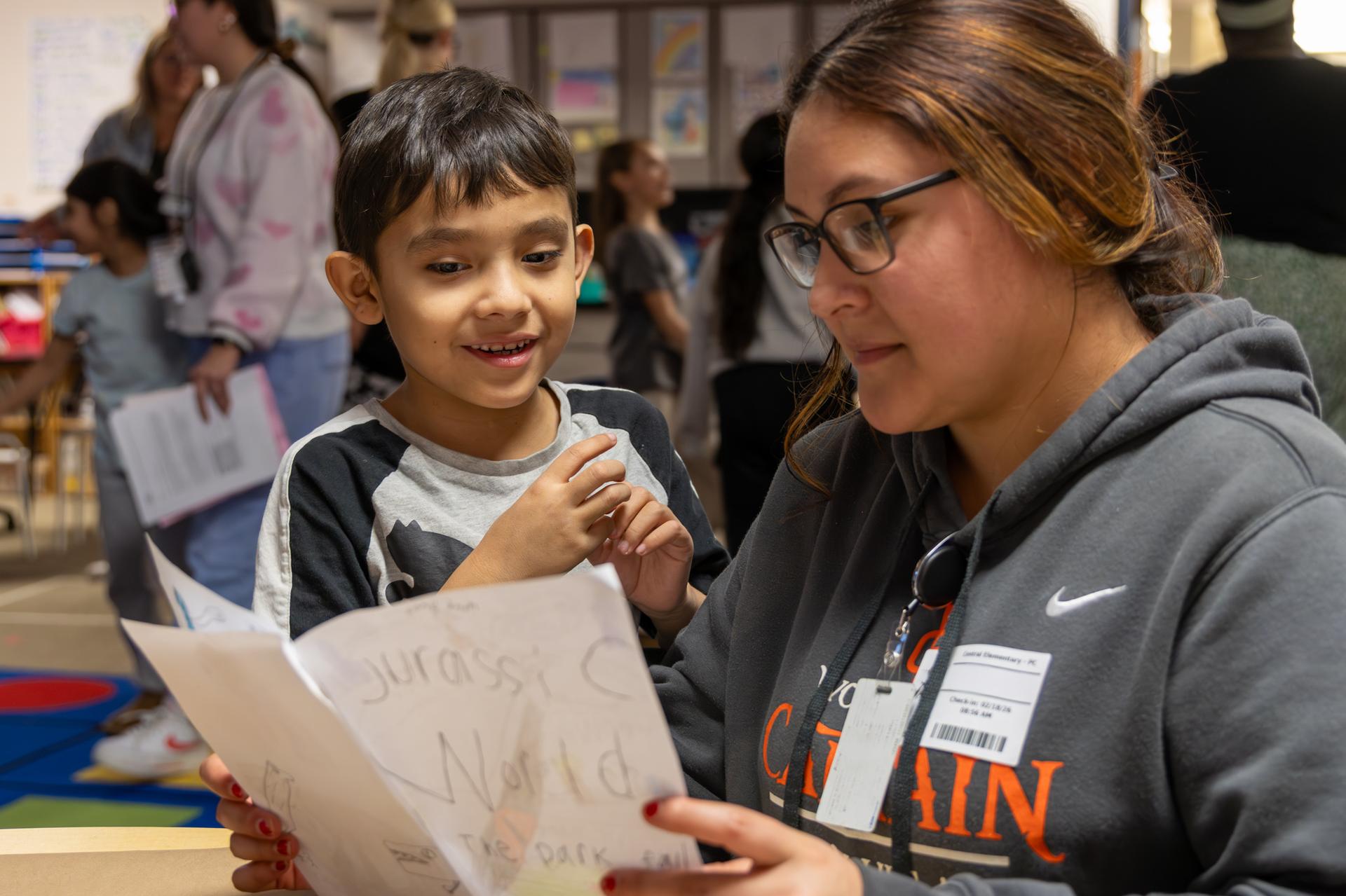 parent reading student book