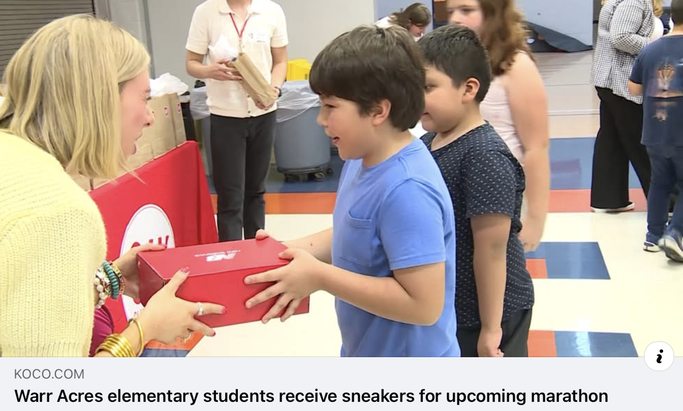 students receiving shoes