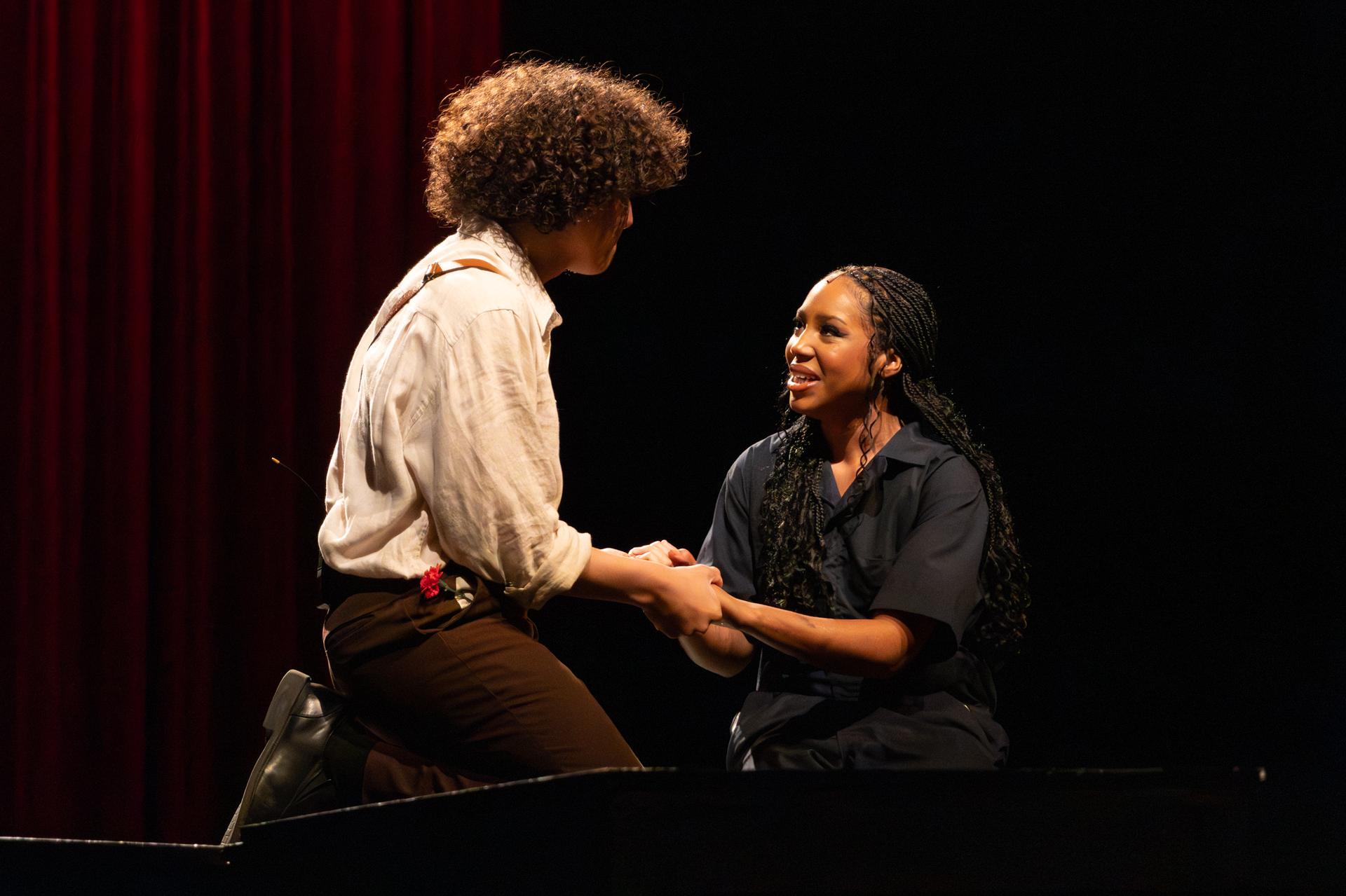 scene of 2 students looking deeply at each other