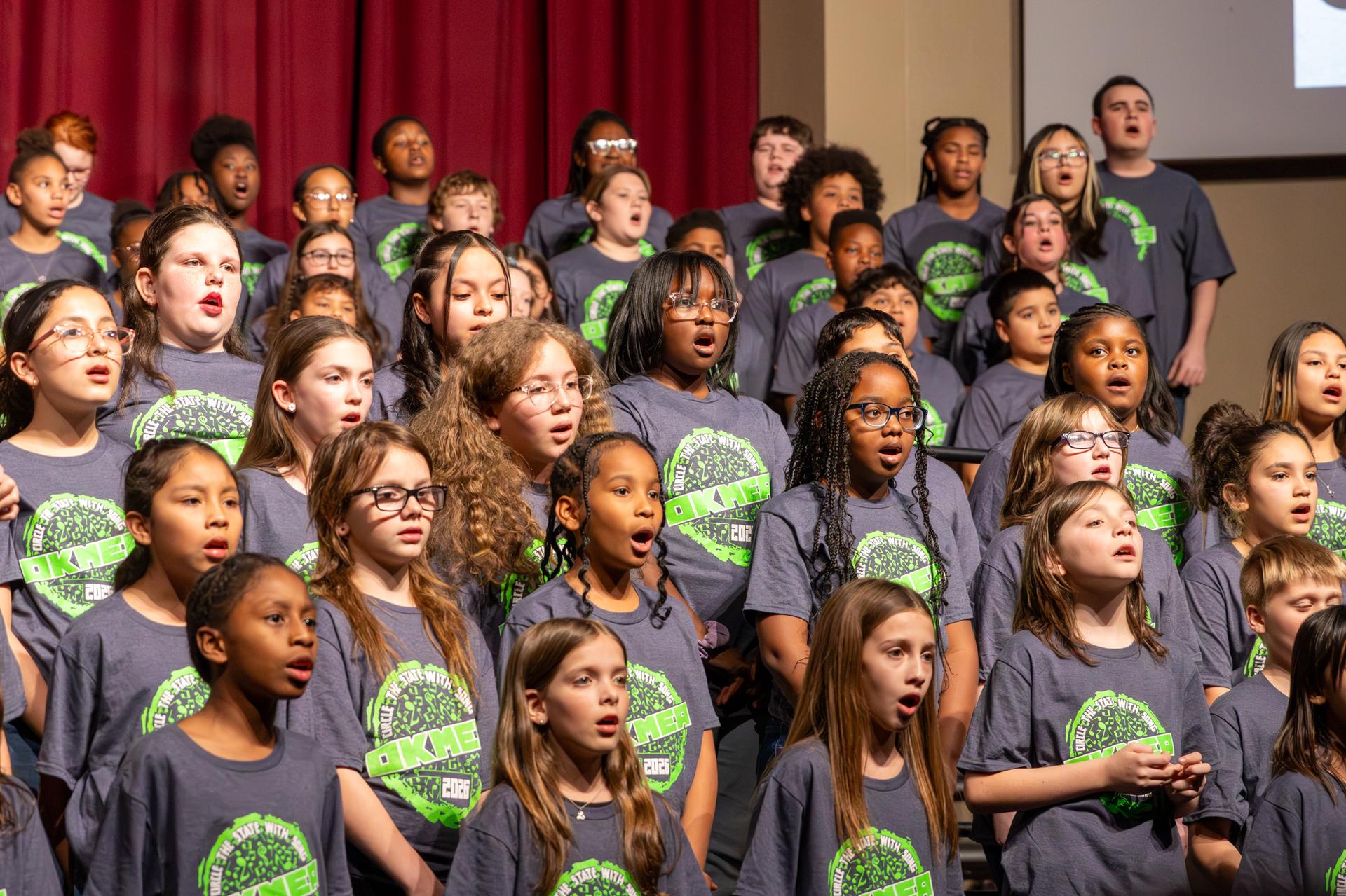 close up of students in the choir singing