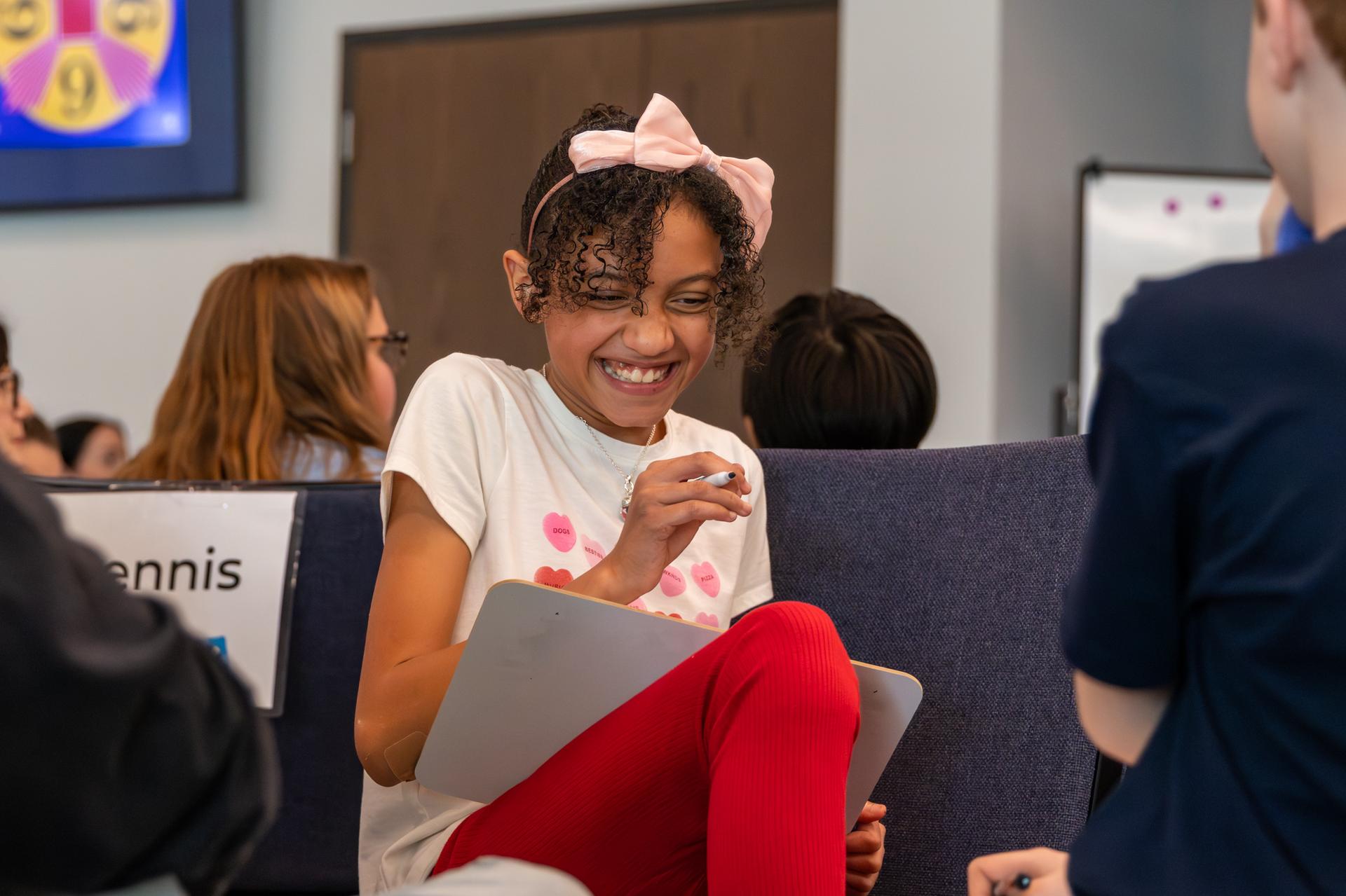 female student laughing