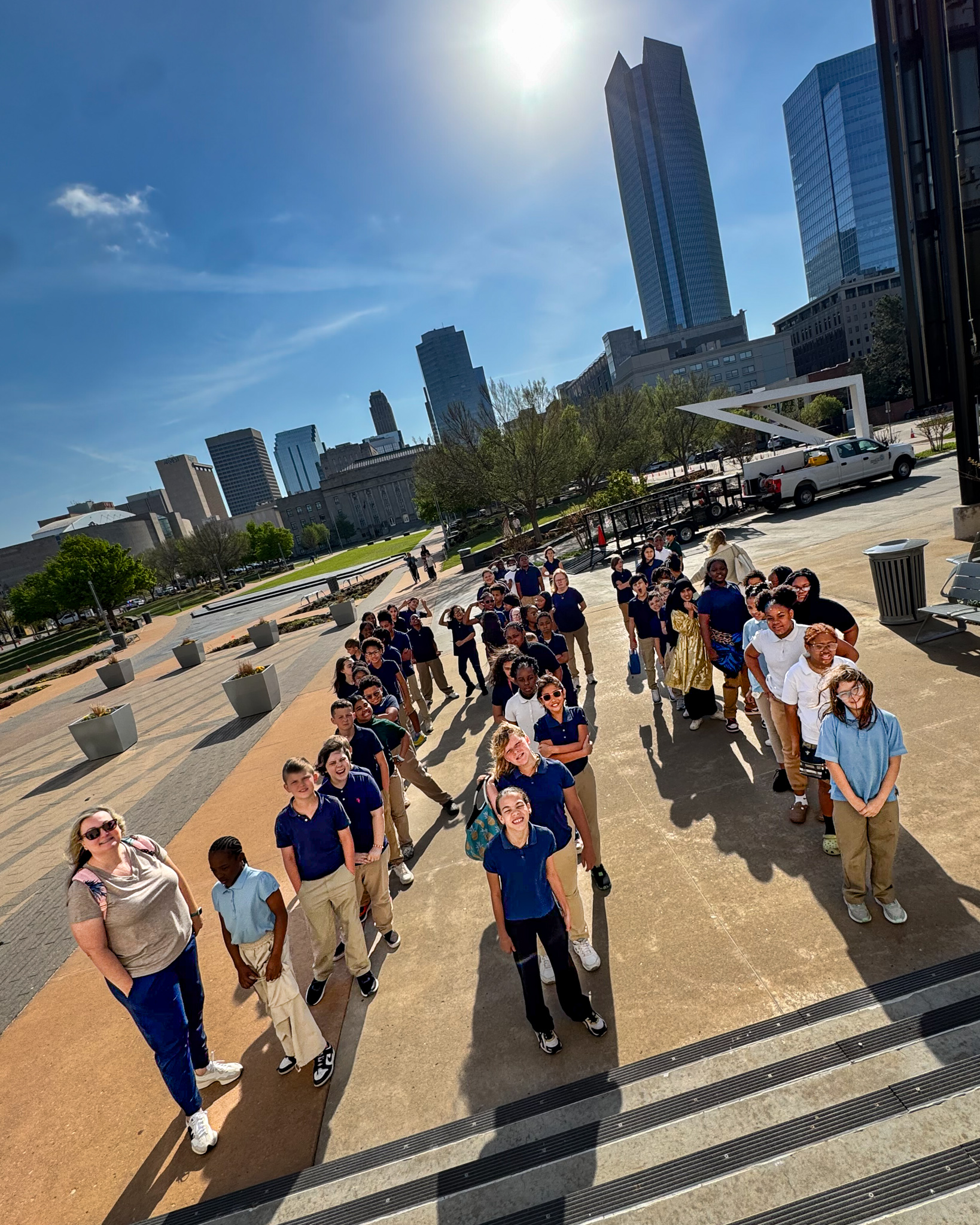 group photo of students in line outside