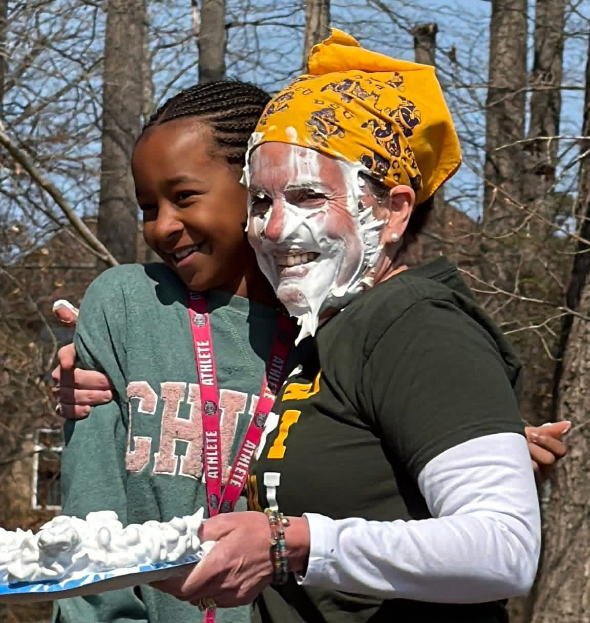 Mrs. Sabbato with student on pi day