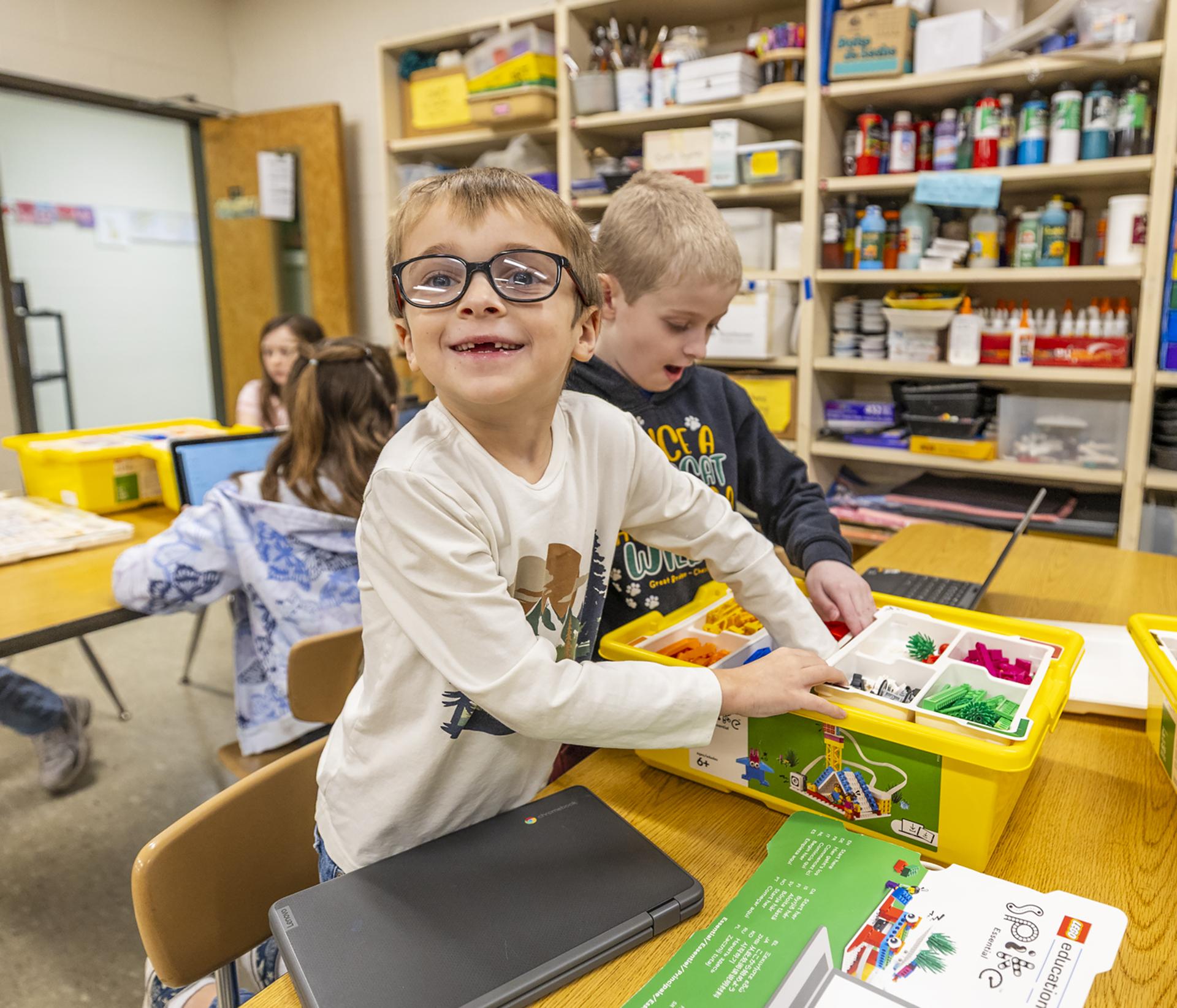 Students building a Lego structure
