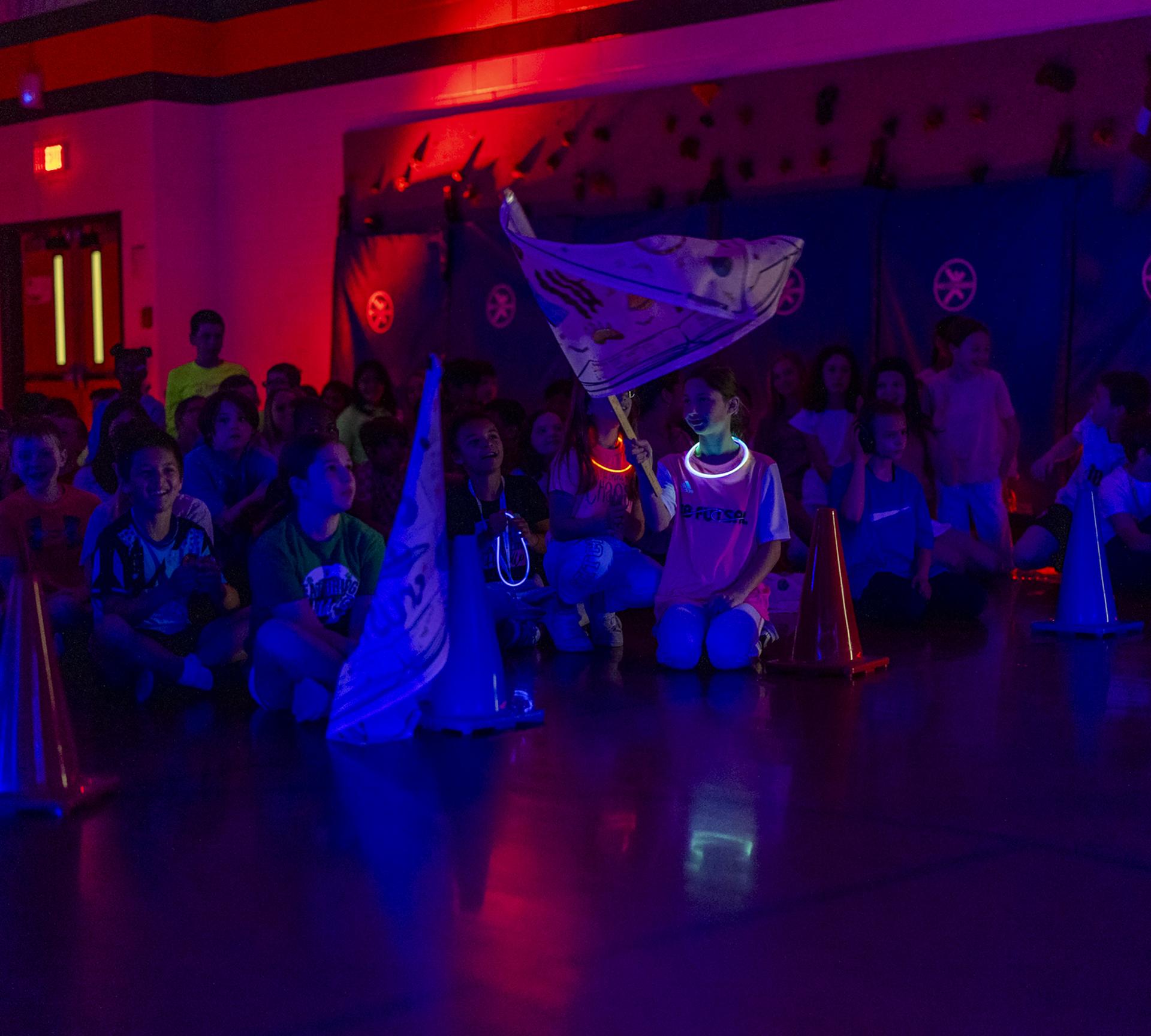 Students cheering during the Glow Run