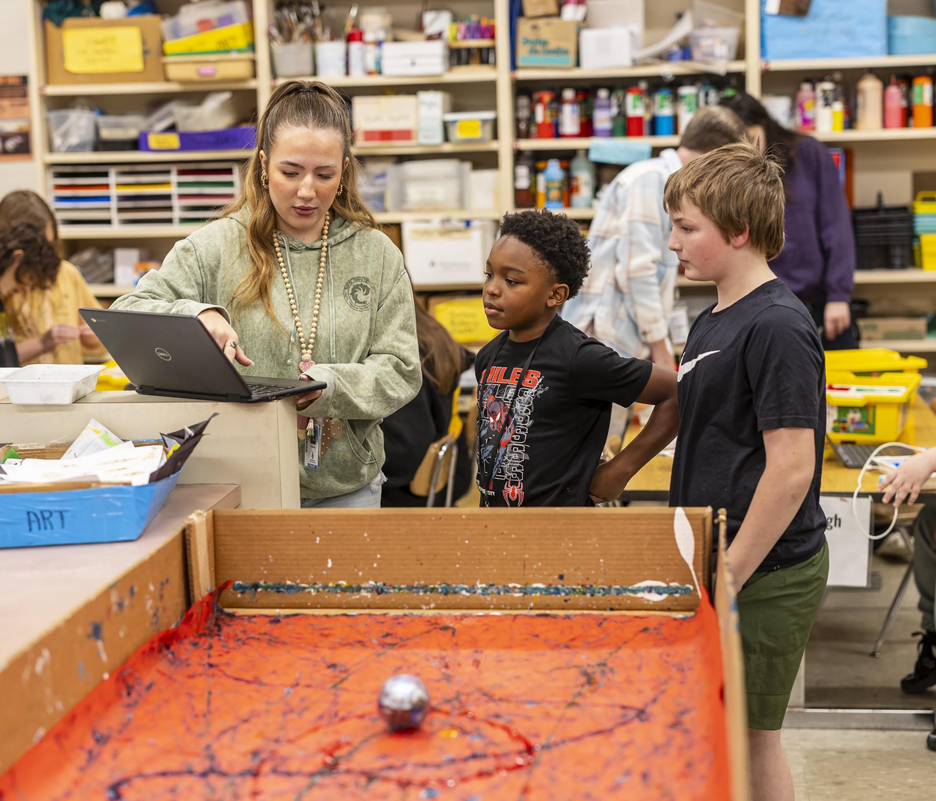 Students programming a Sphero Bolt