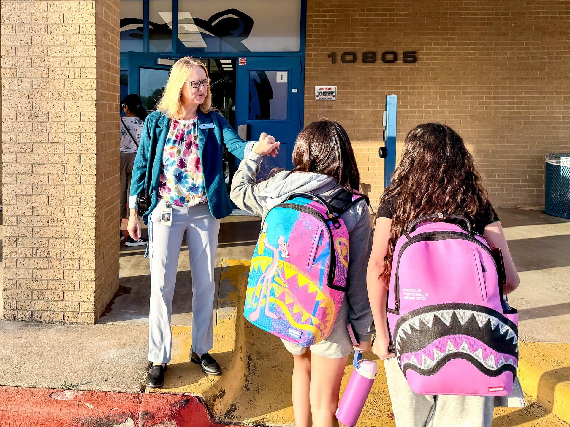 Grisham Middle School Principal Kyla Mills and students Grisham Middle School Principal Kyla Mills and students
