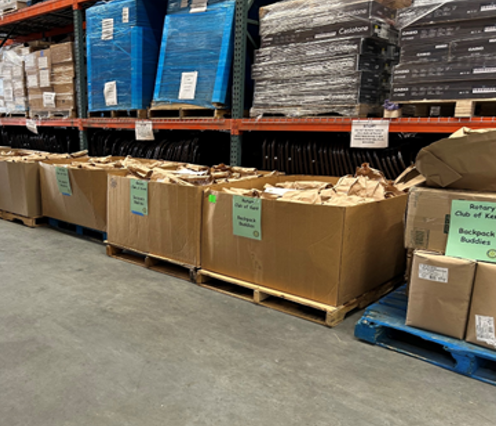 Boxes of the bags of food Rotary Club of Kent prepared for students for the month of September stored in the KSD Administration Campus warehouse.