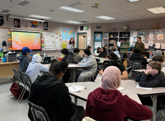 Image of students in a multilingual education classroom where guided language acquisition design strategies are being implemented.