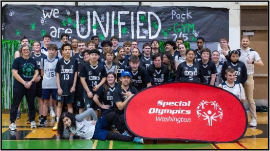 Image of Unified student athletes and coaches at the celebration for Kentwood High Schools status as a Unified Champion School.