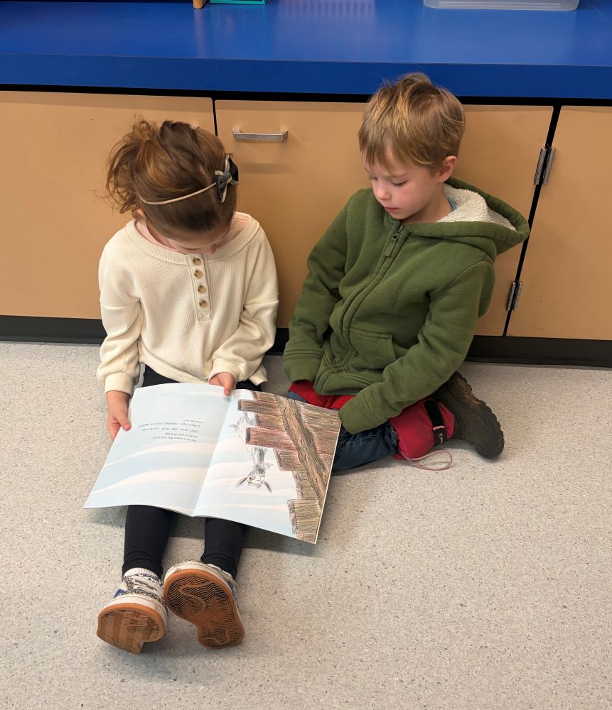 Kindergarteners share a story