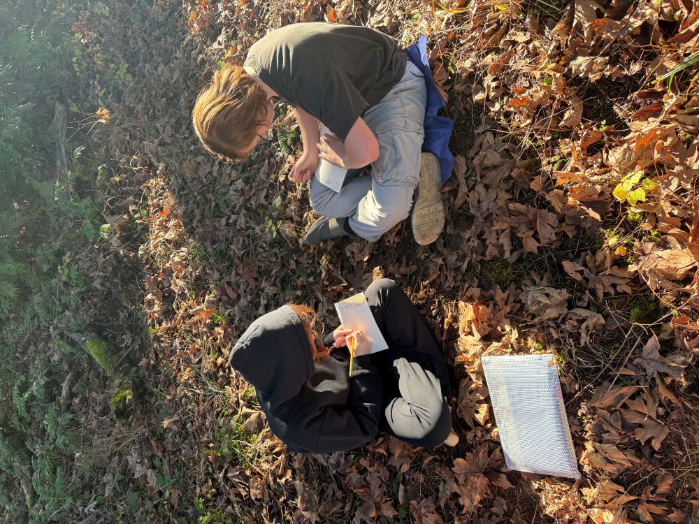 Aleksei and Michella enjoy writing outdoors