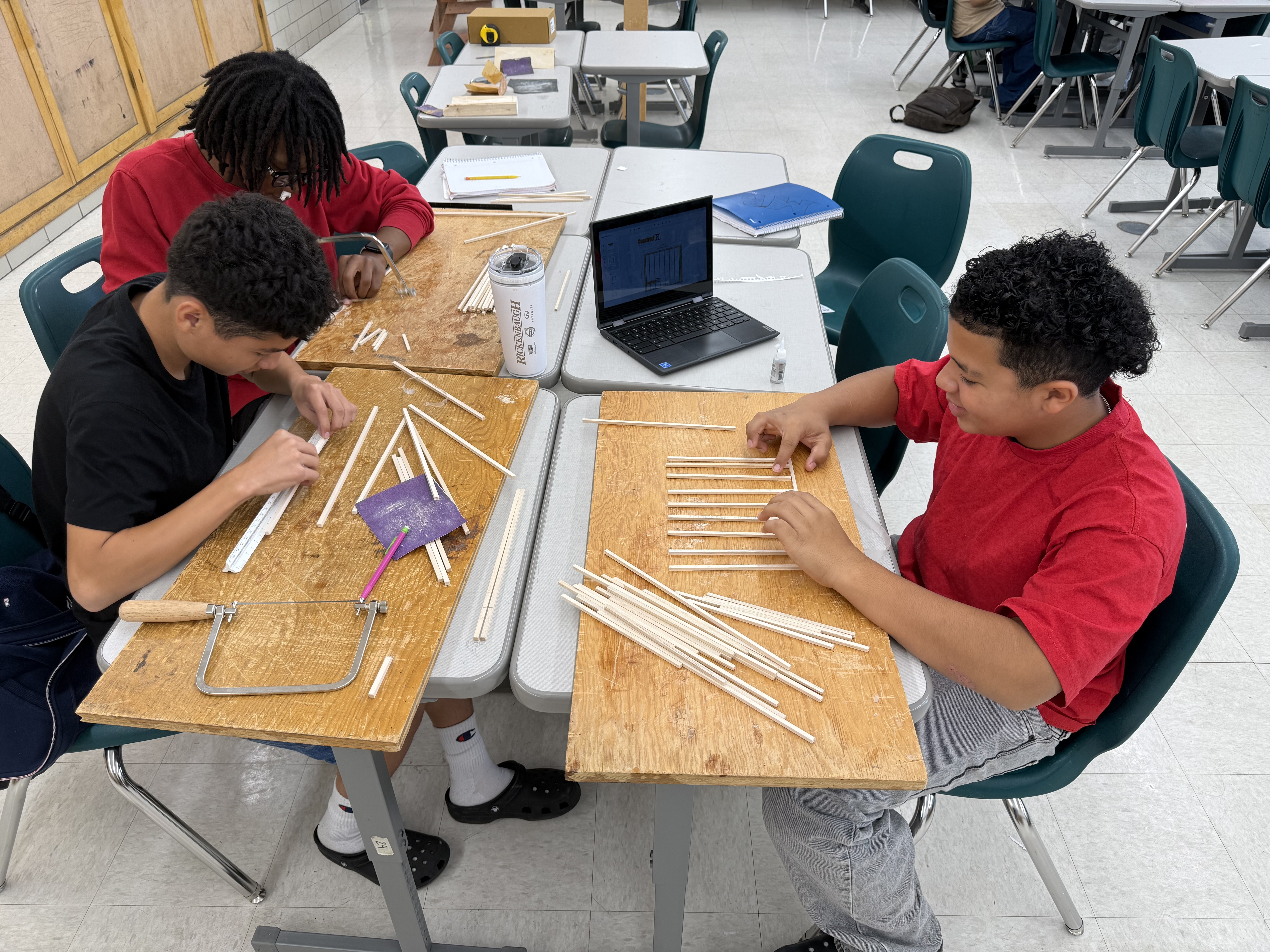 Students work with balsa wood
