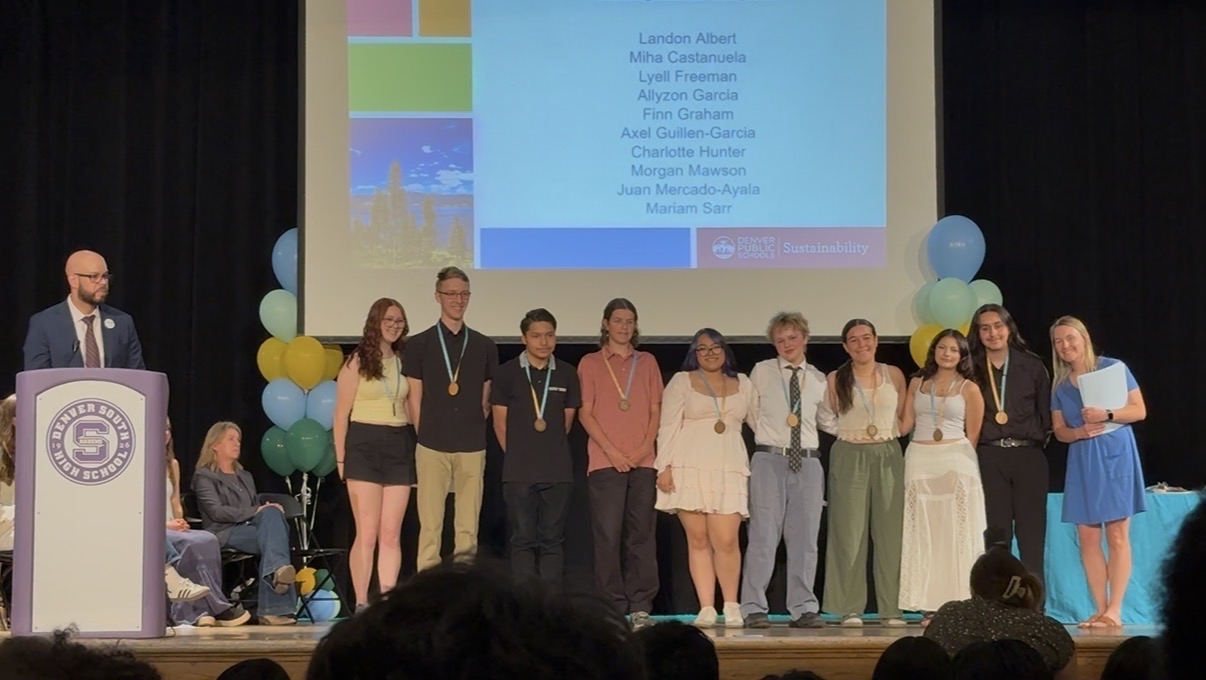 Seal of Climate Literacy students on stage