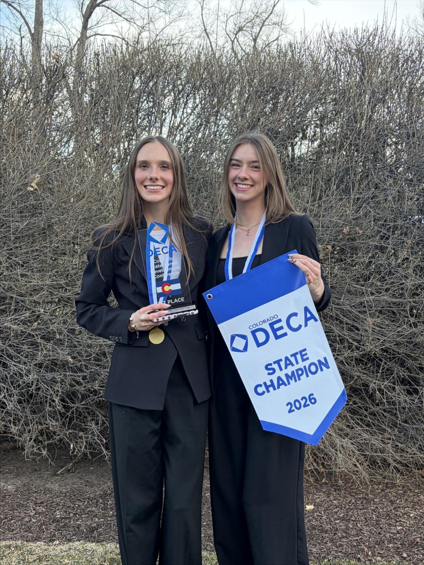 Two DECA winners