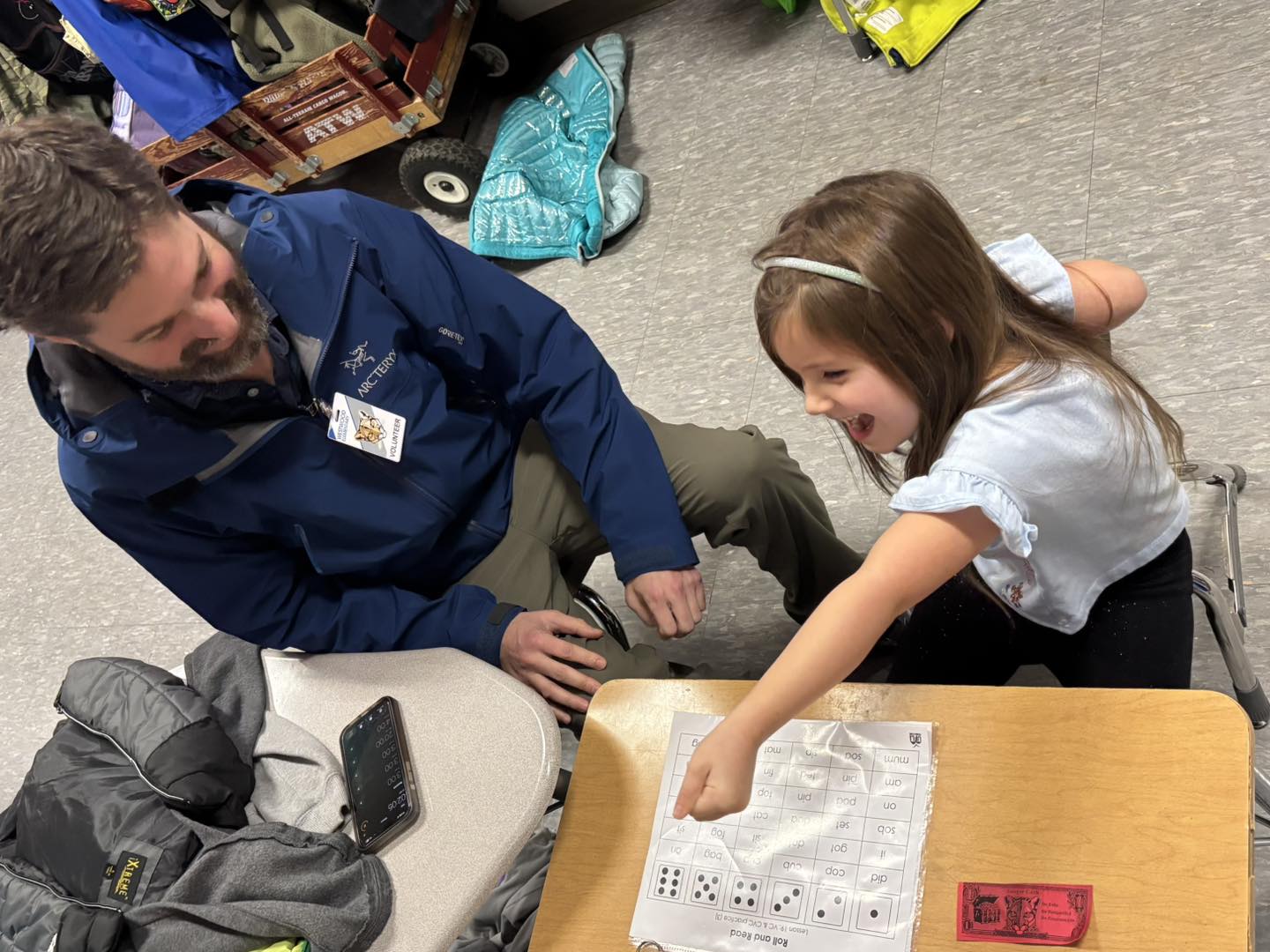Westwood student working on math skills with a parent volunteer