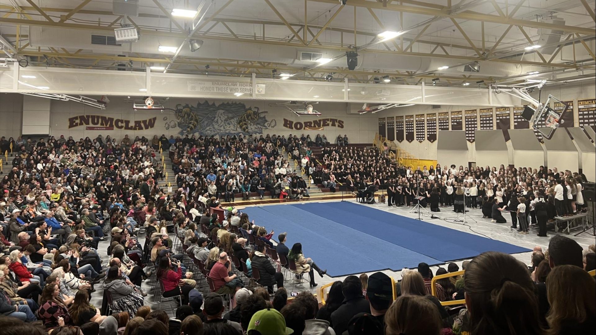 EHS completely filled with students , staff and families for the Chior festival