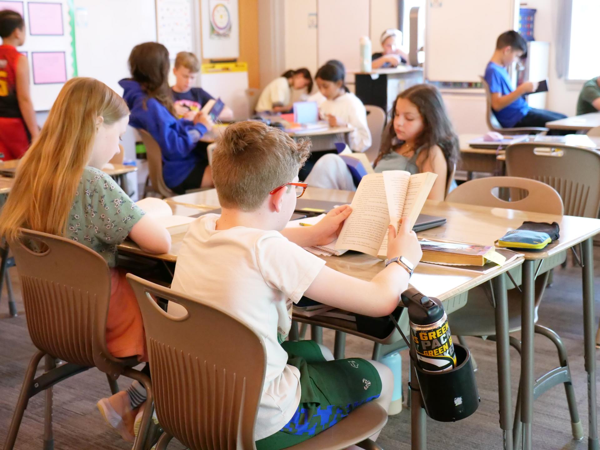 Westwood students dissecting owl pellets in the classroom