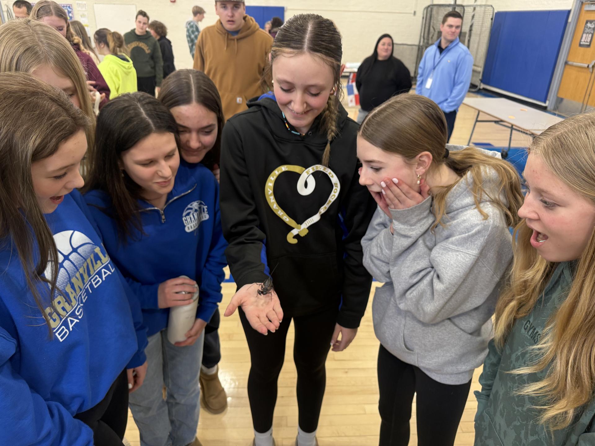 A group of FFA teens walking the hallways of the Jr/Sr High in their Granville FFA jackets