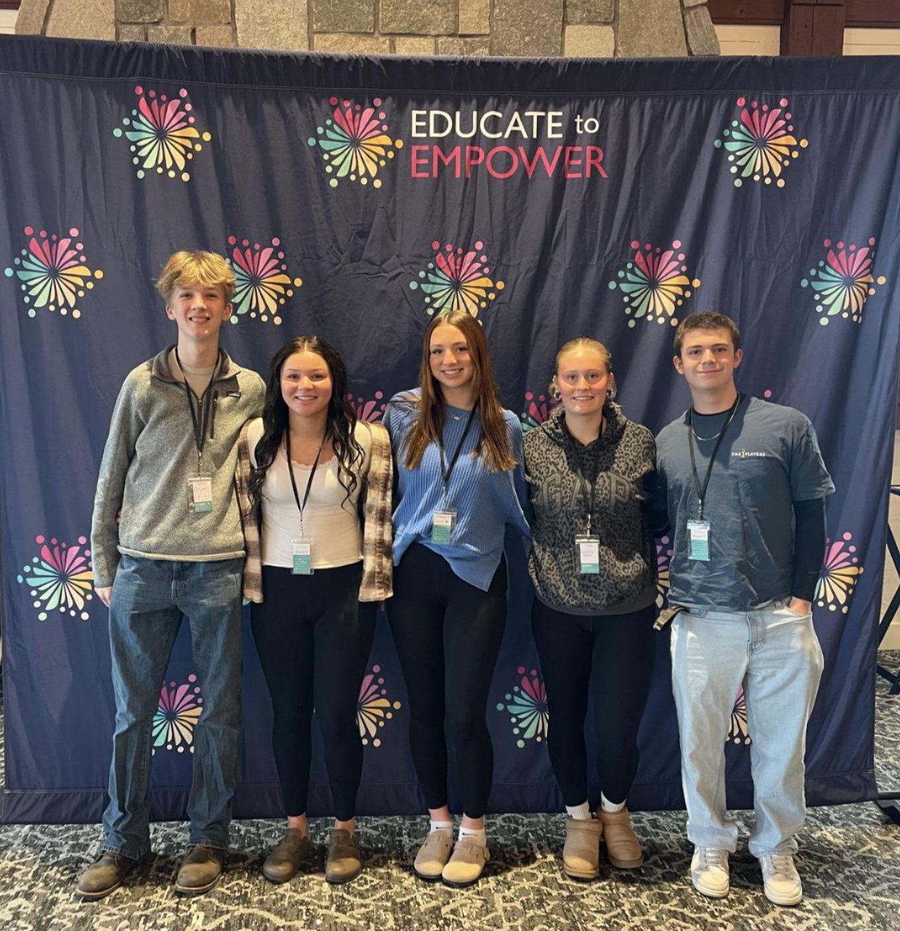 A group of FFA teens walking the hallways of the Jr/Sr High in their Granville FFA jackets