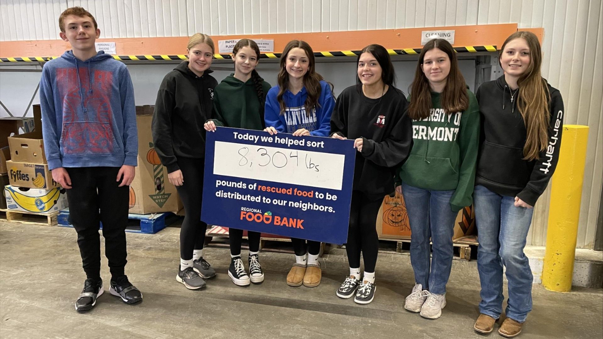 A group of FFA teens walking the hallways of the Jr/Sr High in their Granville FFA jackets