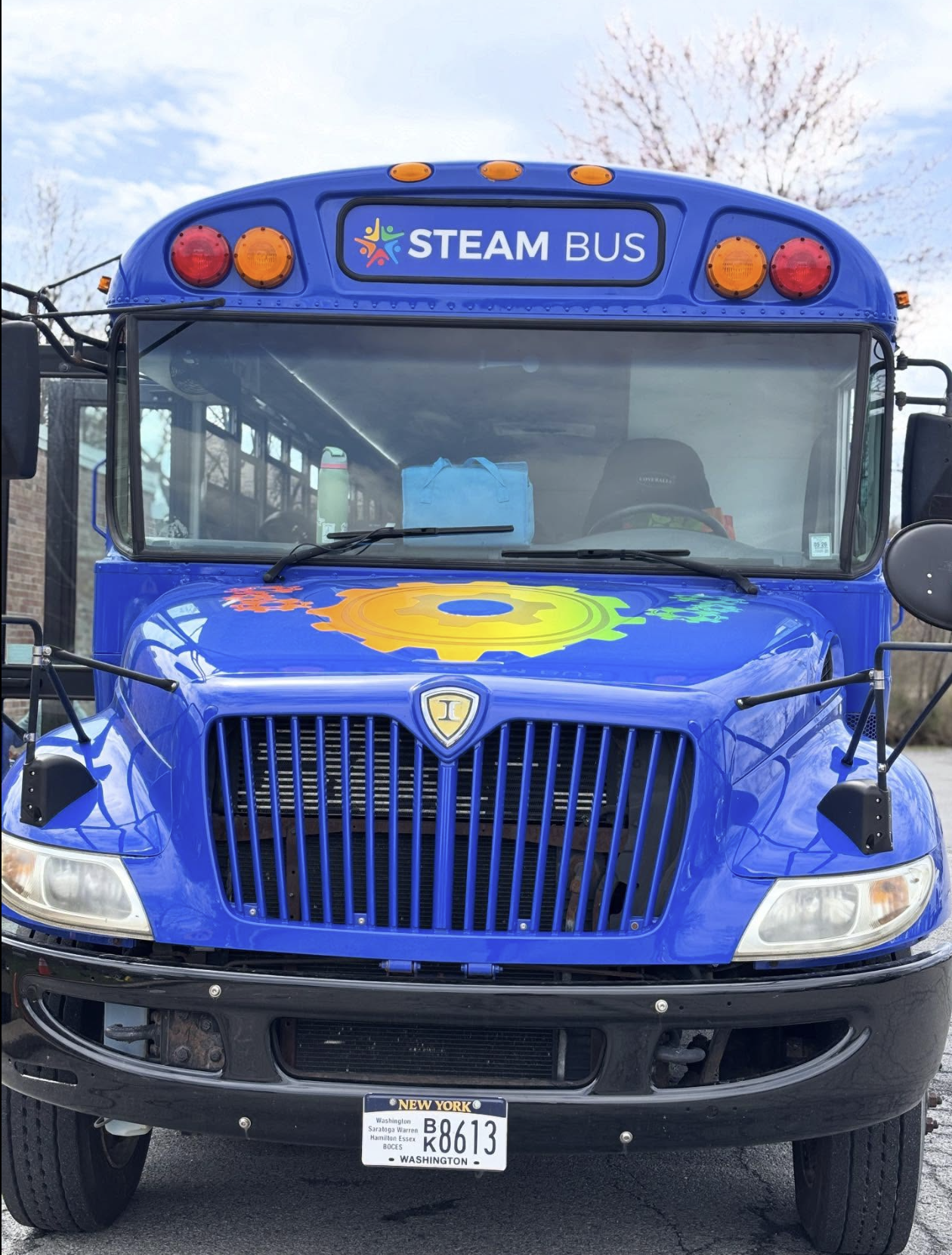 A picture of the front of the blue BOCES STEAM BUS