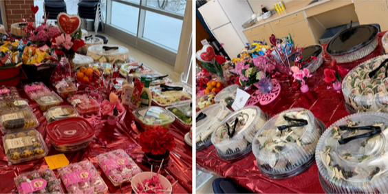 Variety of foods spread out on a table decorated with Valentine's Day Decor