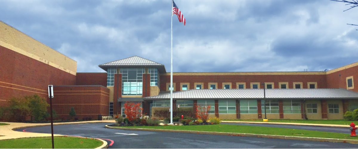 Front of KHS building with flagpole