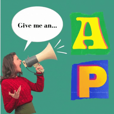 Woman shouting into a megaphone the letters 