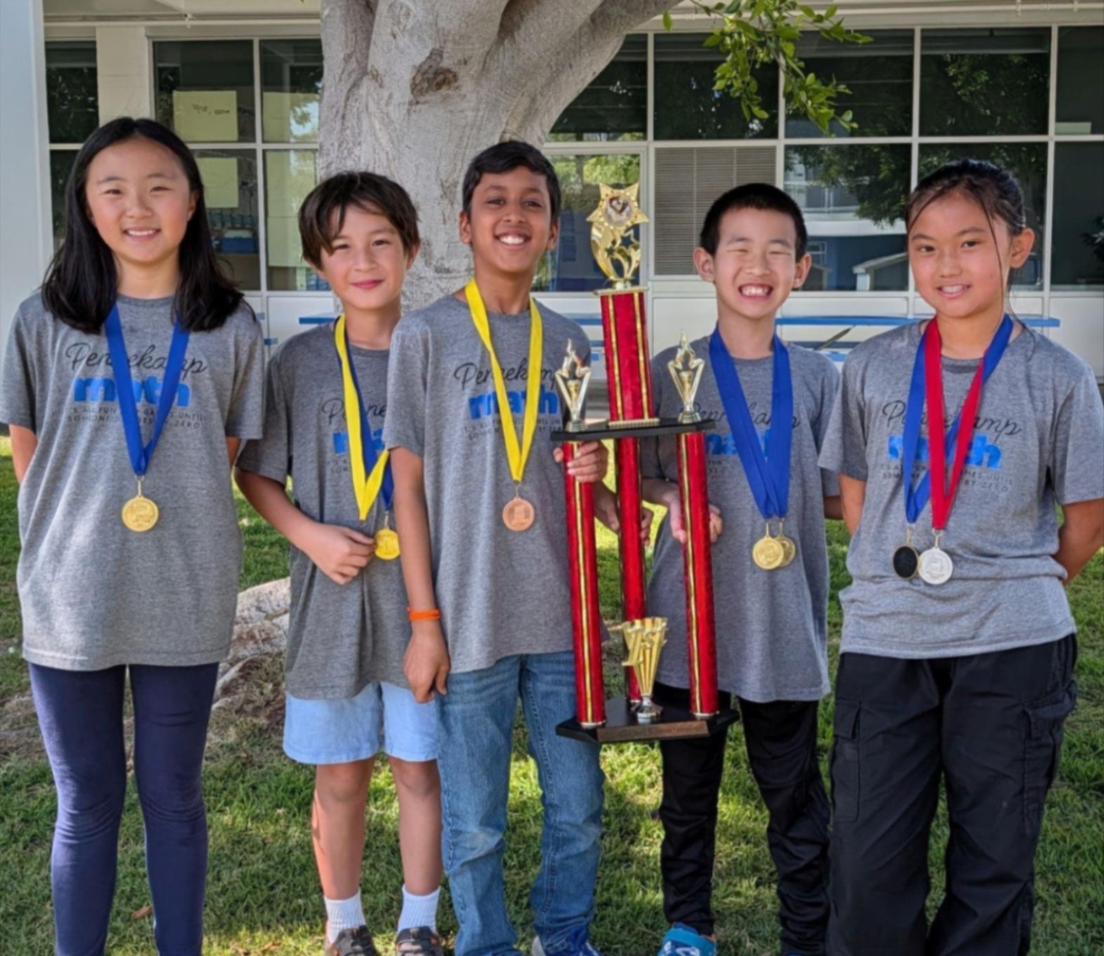 Pennekamp mathletes holding trophy