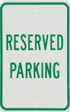 photo of street sign with words reserved parking