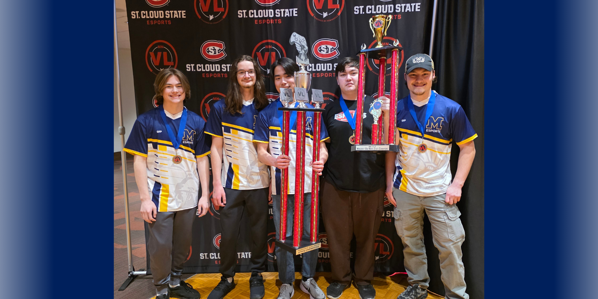 Esports team holding trophy 