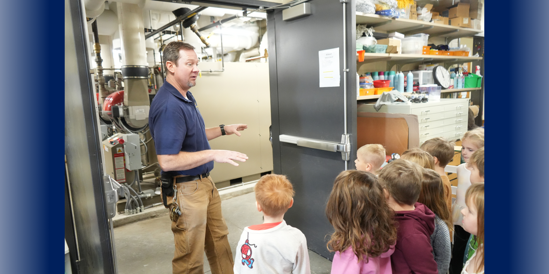 Students exploring custodian office with Mr. Dan