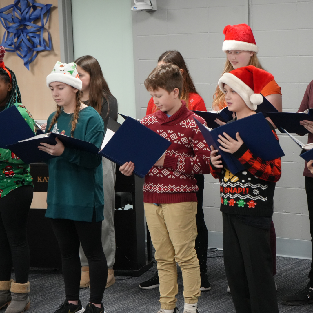 Choir students singing during last year's community lunch