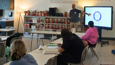 Dr. Hirschi gives presentation to class