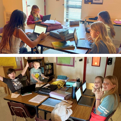 6th graders working in groups of 4 on laptops