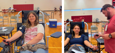2 high school girls donating blood