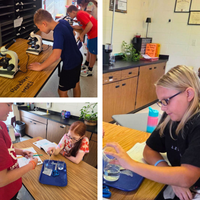 6th graders looking through microscopes