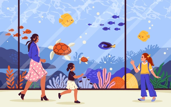 Clip art de una escena en la que aparecen un maestro y dos estudiantes en una excursión a un acuario. Caminan frente a una alta pared de cristal, con peces, tortugas marinas y corales en el agua detrás del vidrio.