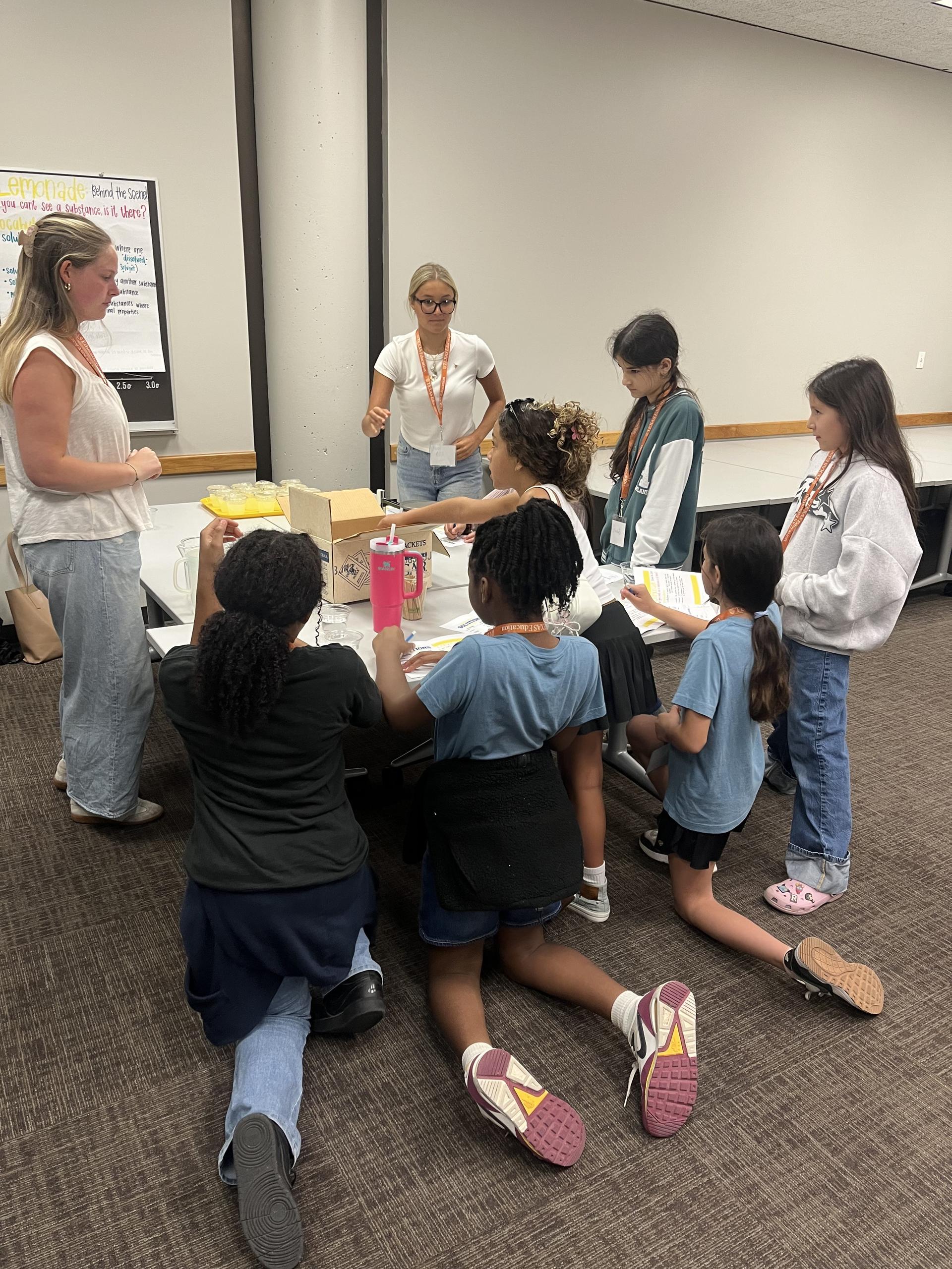  Fifth graders engaging in math and science stations on the field trip to UT this week.  