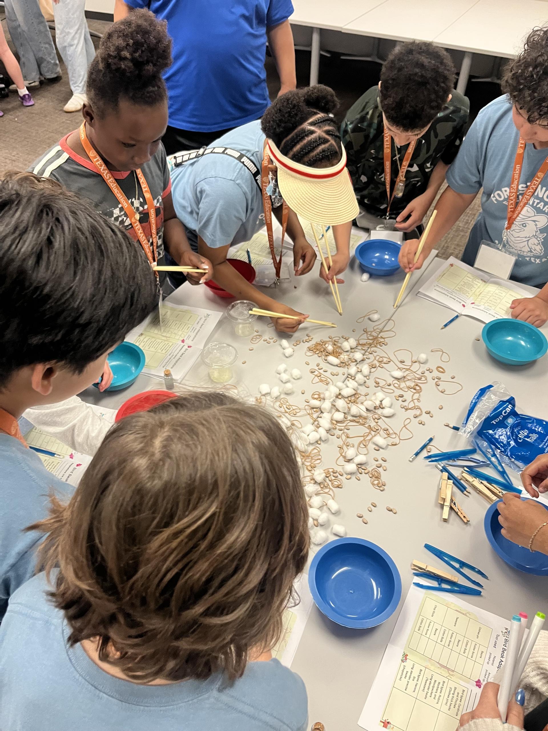  Fifth graders engaging in math and science stations on the field trip to UT this week.  