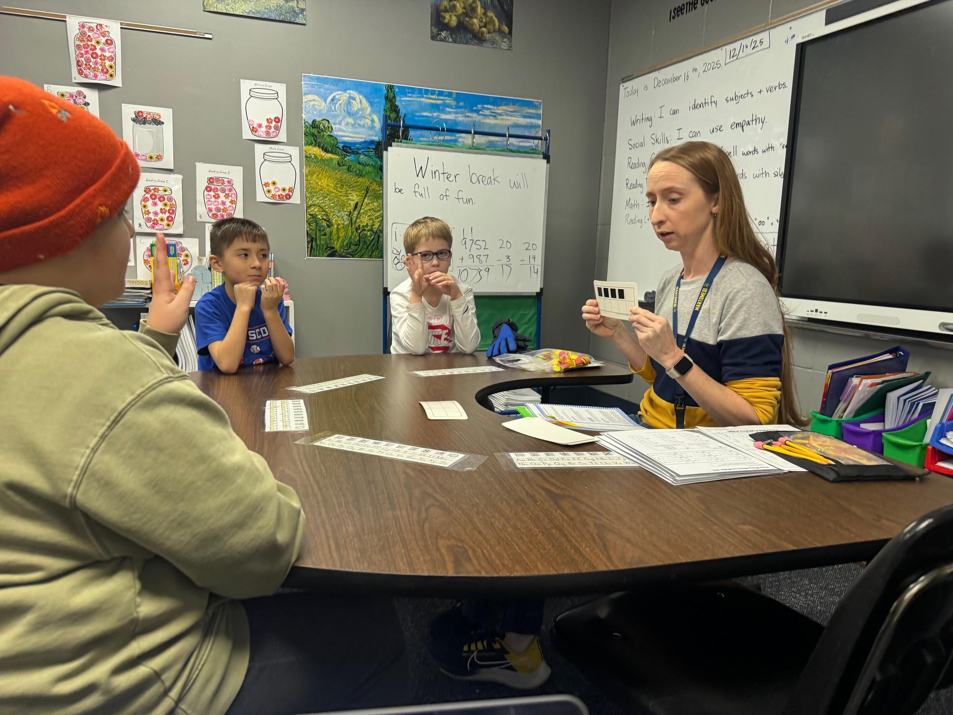 Teacher with students
