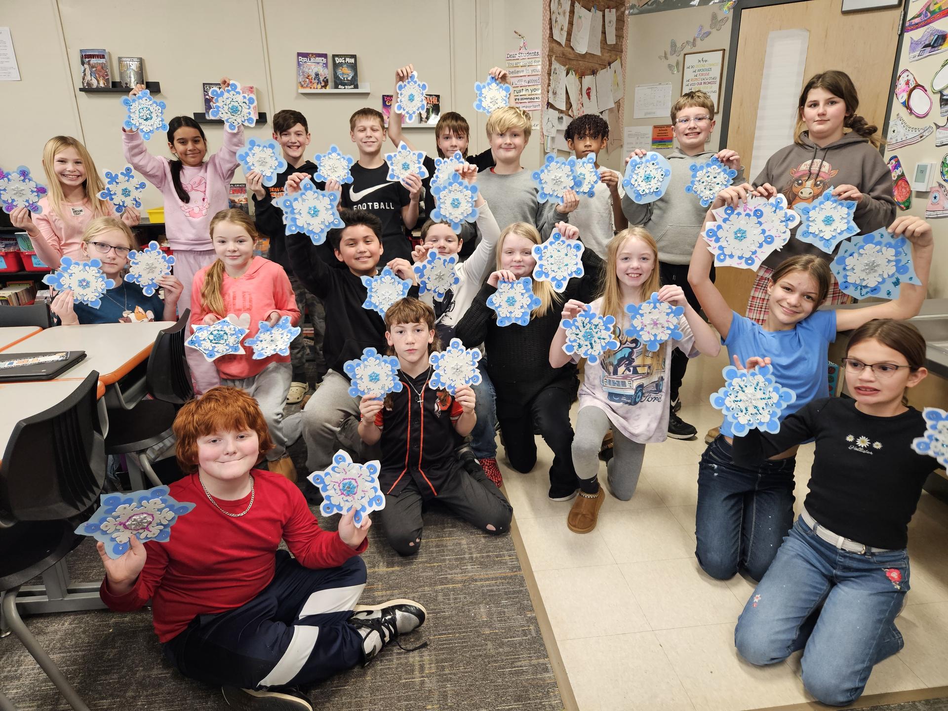 Mrs. Slusher's class learned to make decorative snow flakes with Mrs. Latourette (retired Dowagiac teacher).