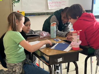 Working together to create a summary statement.