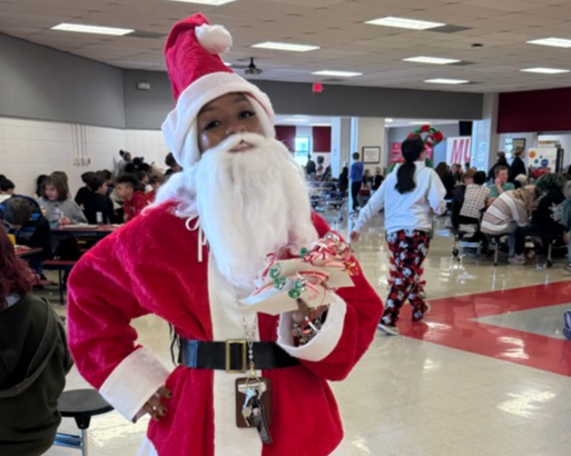 Mrs. Claybon dressed up as santa 