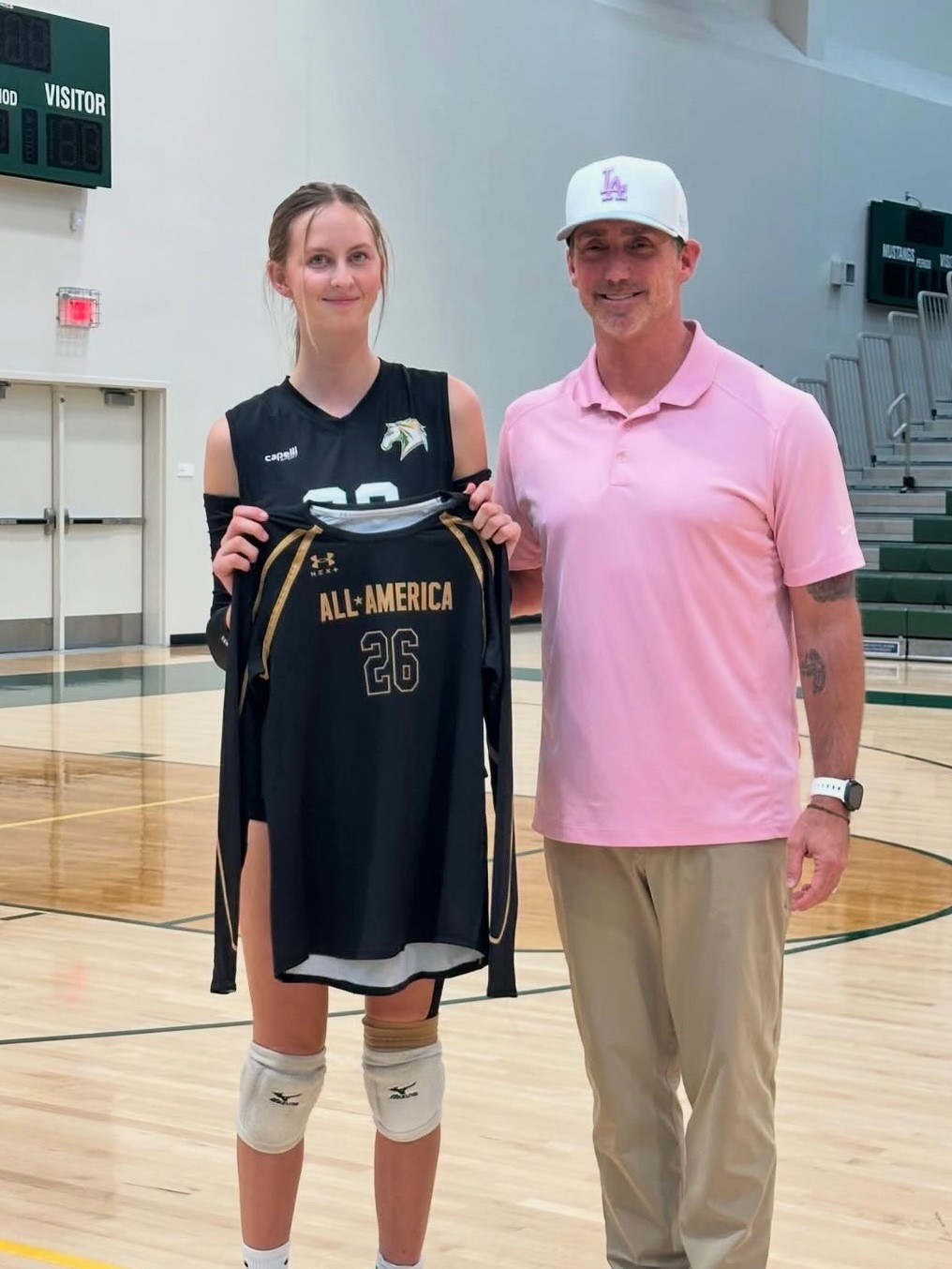 Audrey Flanagan and man in pink shirt