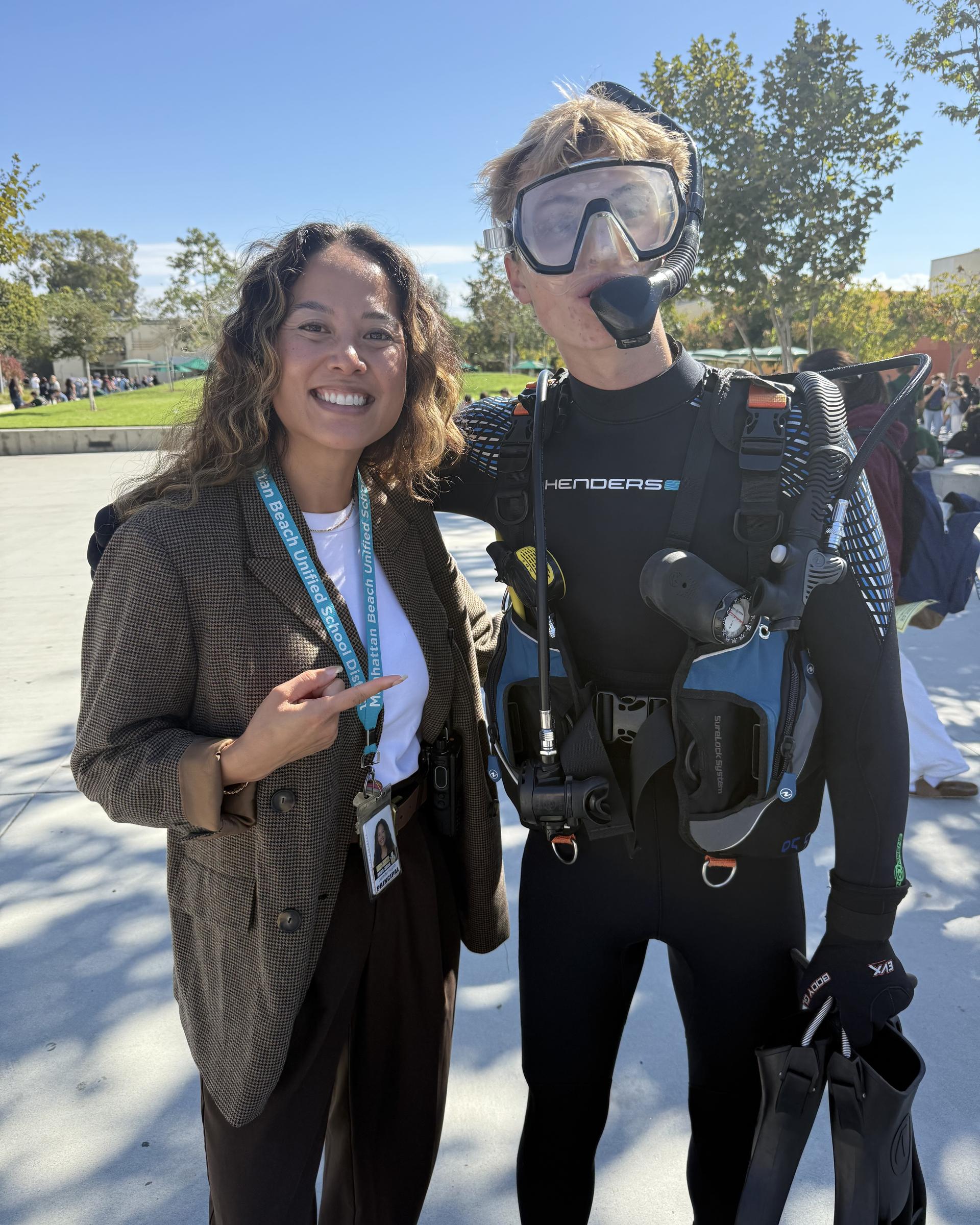 Principal and scuba kid