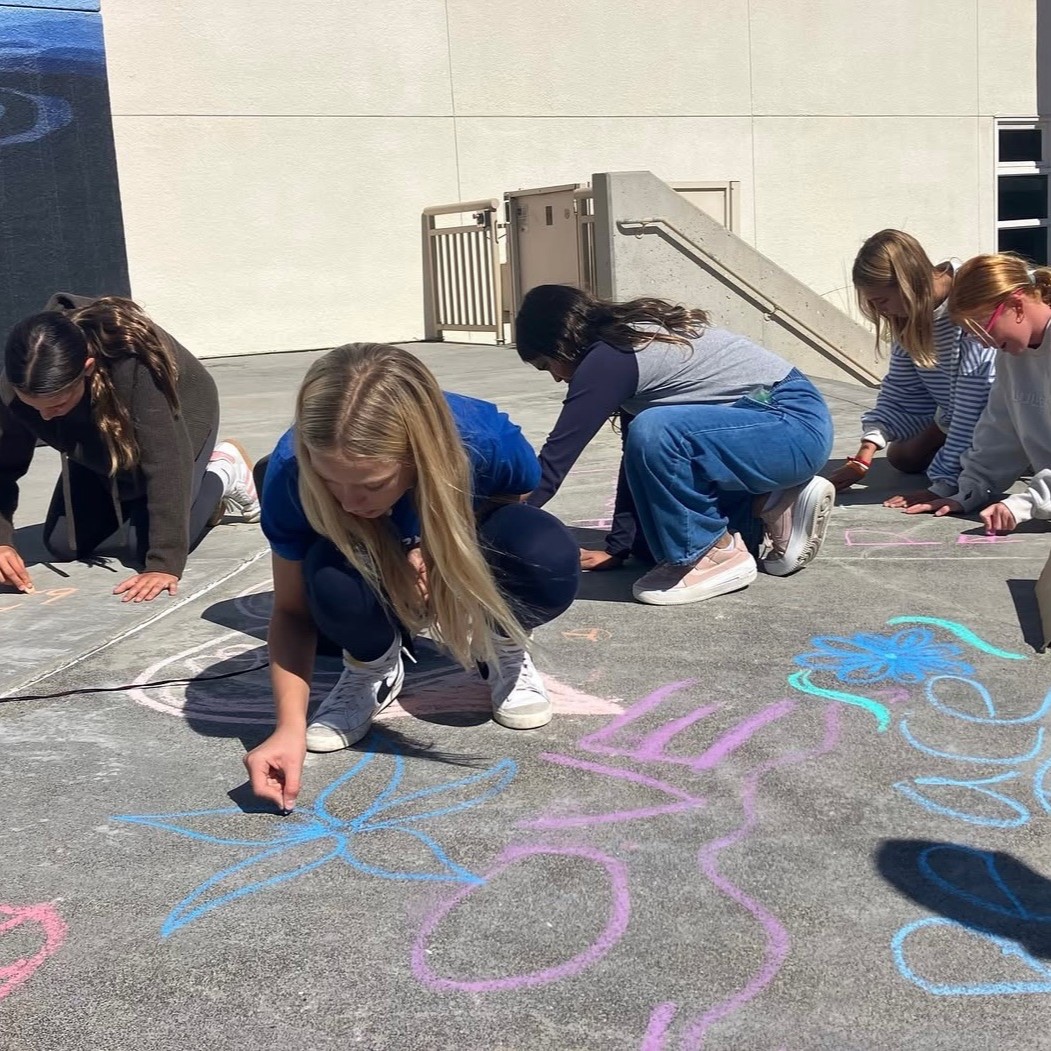 kids drawing with chalk