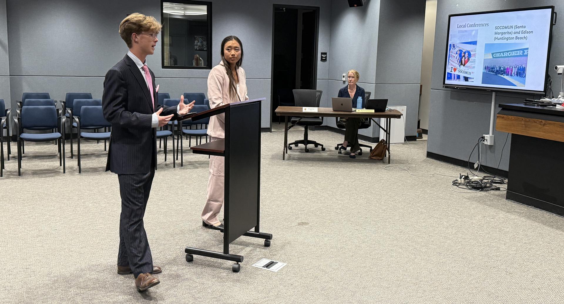 MUN students at board meeting
