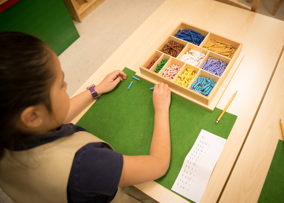 Student working with bead bars